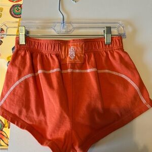FP Movement orange shorts
